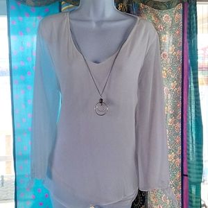 Layered White Blouse With Jewlery